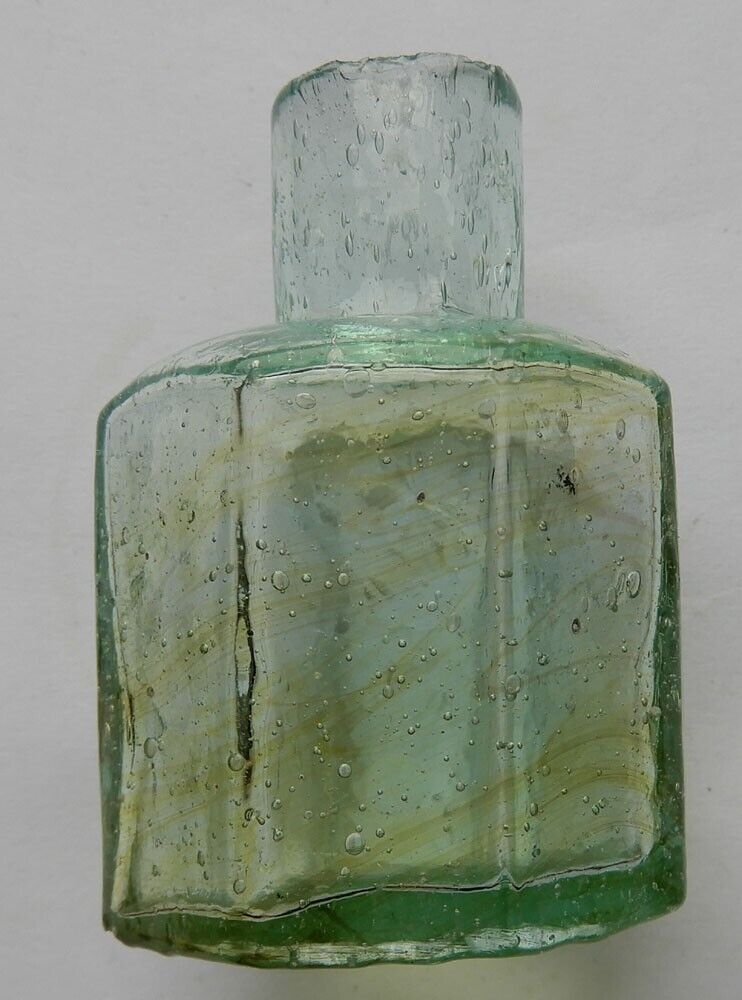 Swirly octagonal ink bottle with air bubbles c1910-20