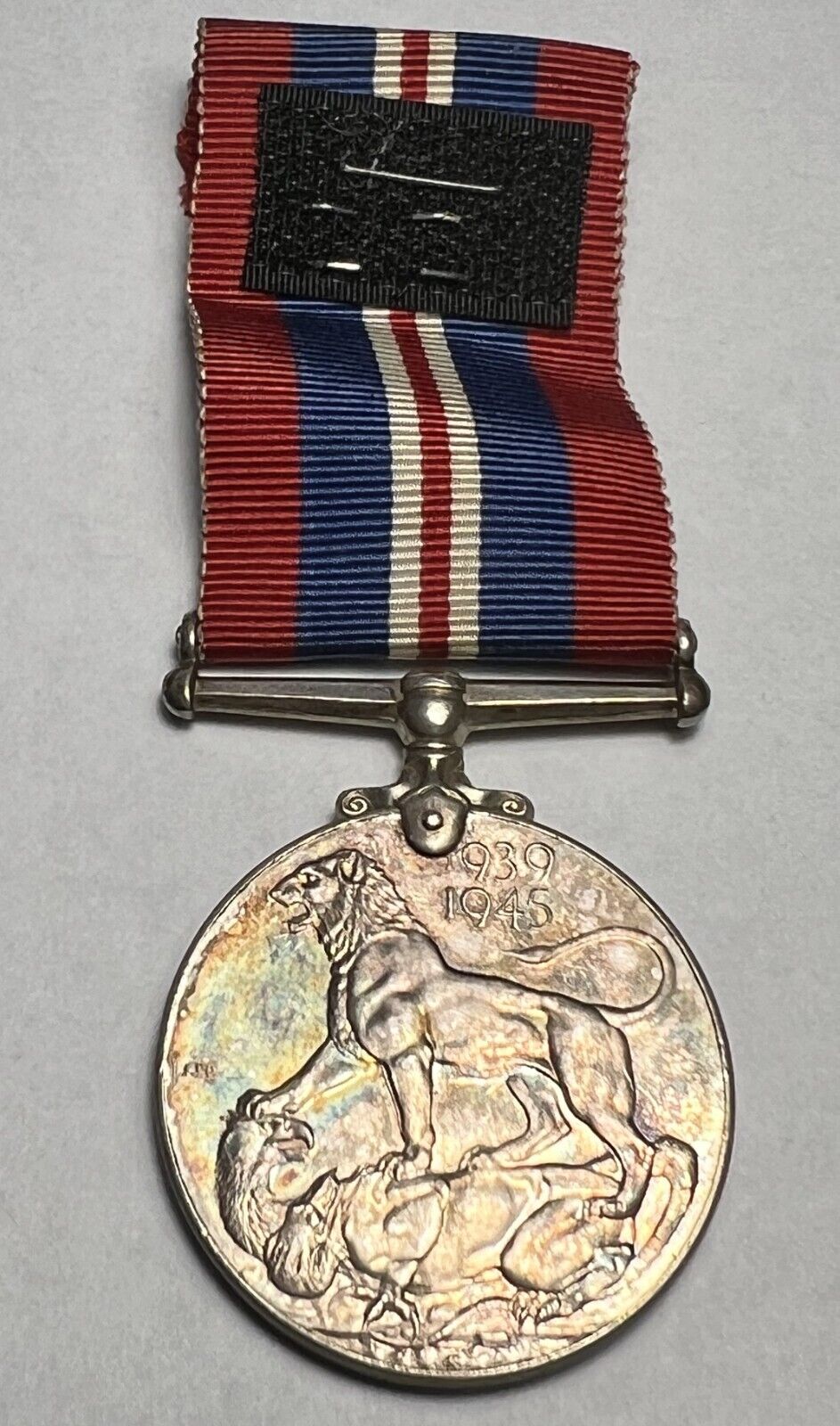 Original WWII Great Britain Military The War Medal 1939-1945 w/ Ribbon (Toned)