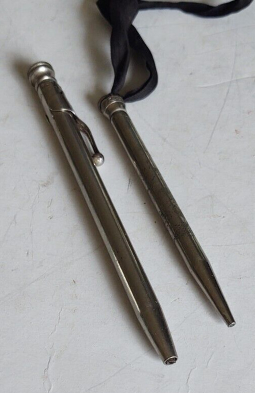 2 Antique Mechanical Pencils 1 has Indian Chief Clip dated 1915 & marked \