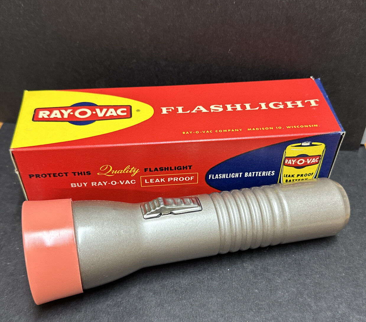 Ray O Vac Vintage Steel Metal Flashlight Made In USA silver with pink B99SM NOS