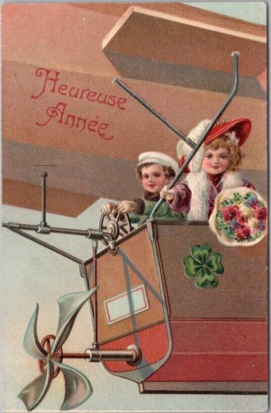 Vintage 1900s PFB Embossed 9067 / French New Year Postcard Boy & Girl / AIRPLANE