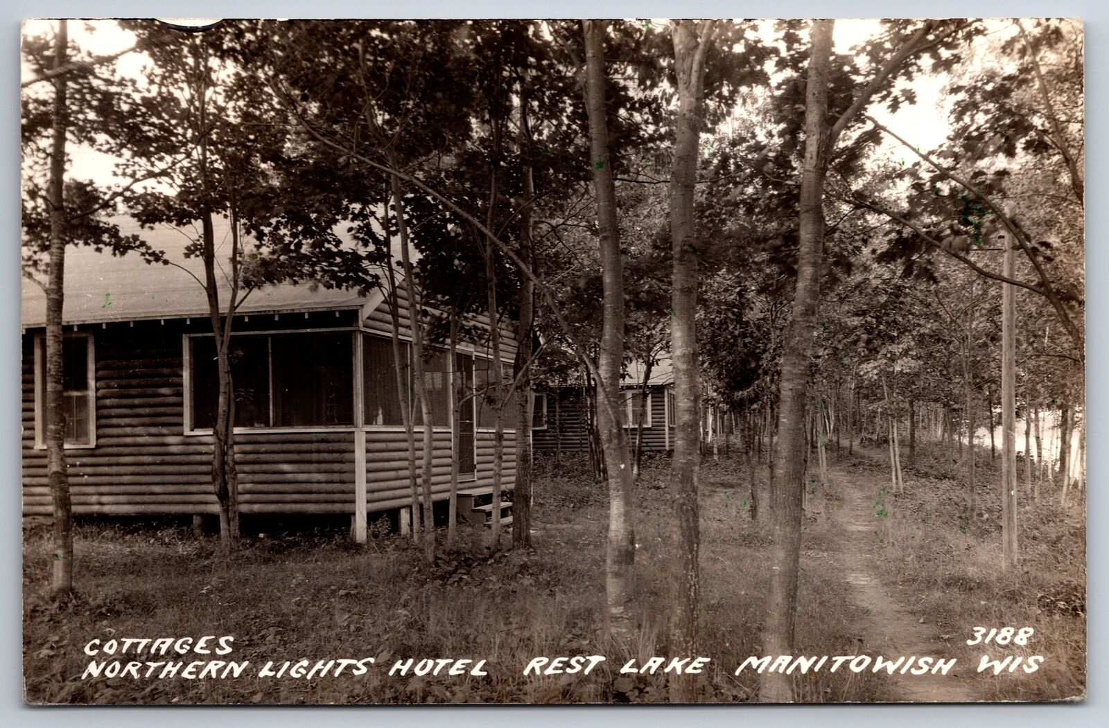 Manitowish Wisconsin~Northern Lights Hotel Cottages @ Rest Lake~1937 RPPC