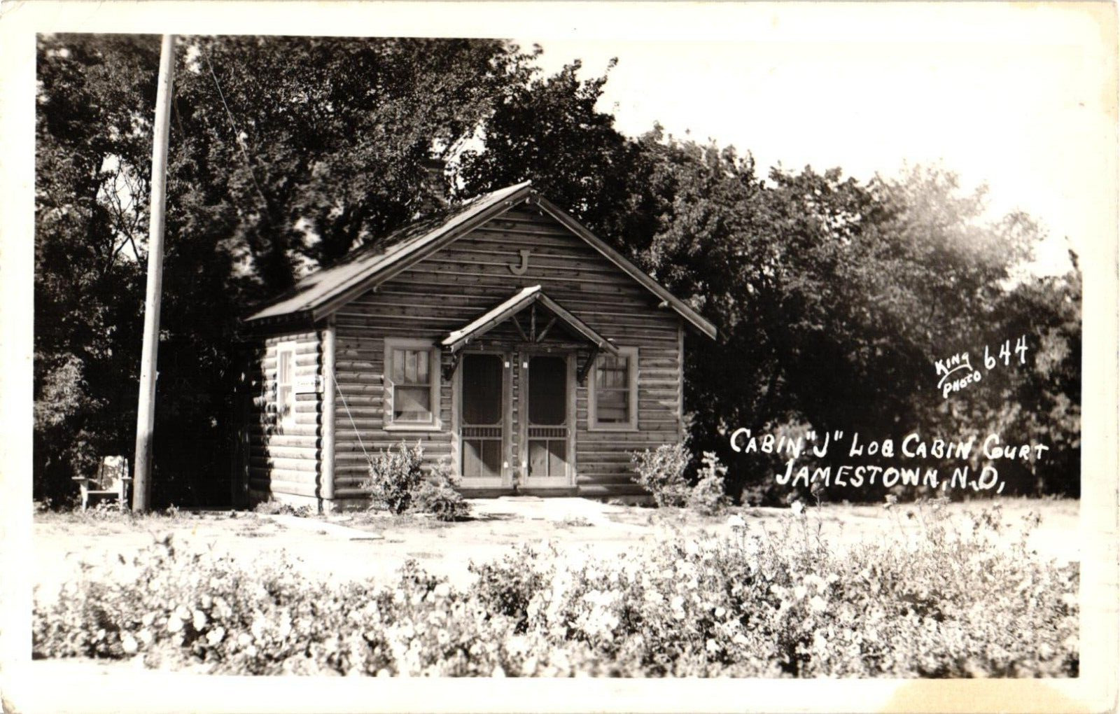 RPPC Postcard Cabin J Log Cabin Court Jamestown North Dakota ND King Photo 1939