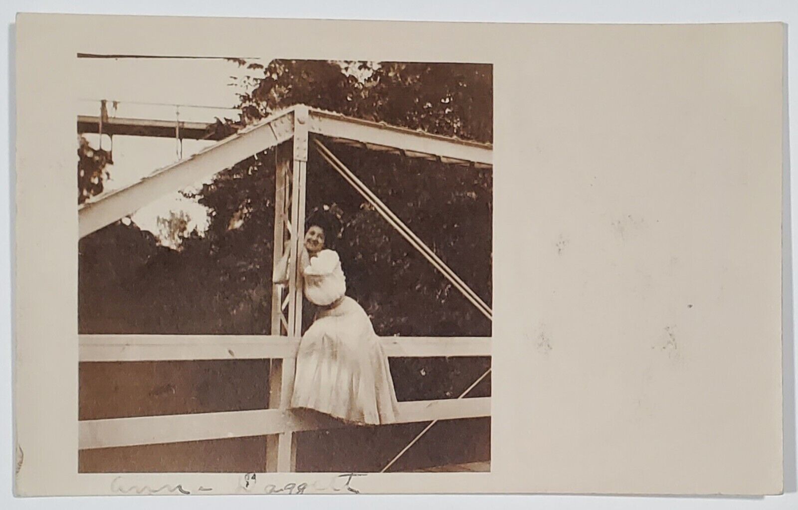 Edwardian Women Flirting Pose Sitting on Bridge Rails Anna Daggert Postcard Z30