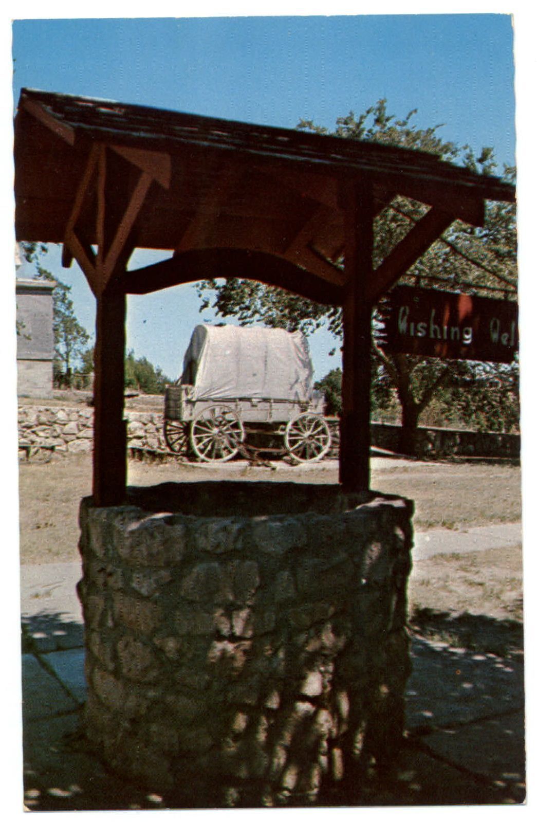 Meade Kansas Dalton Gang Well now wishing well covered wagon unused postcard