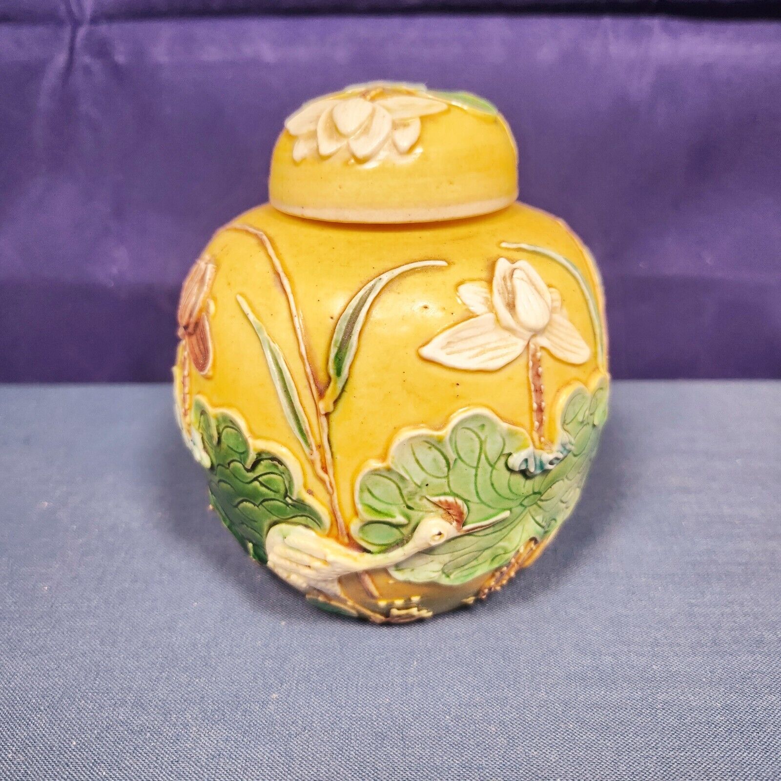 Small yellow-glazed covered jar with auspicious meaning of 