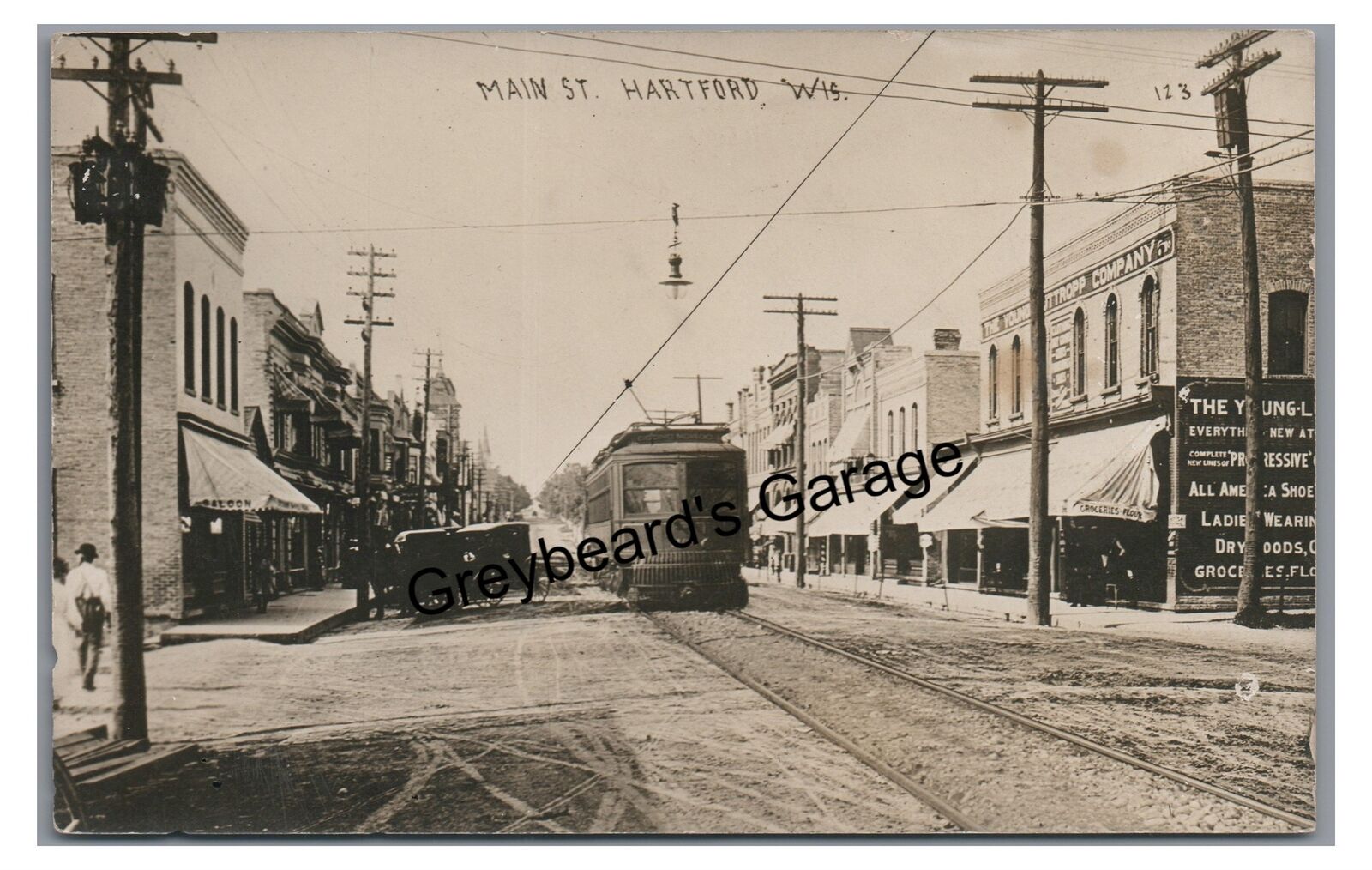 RPPC Added Trolley Main Street HARTFORD WI Wisconsin 1911 Real Photo Postcard