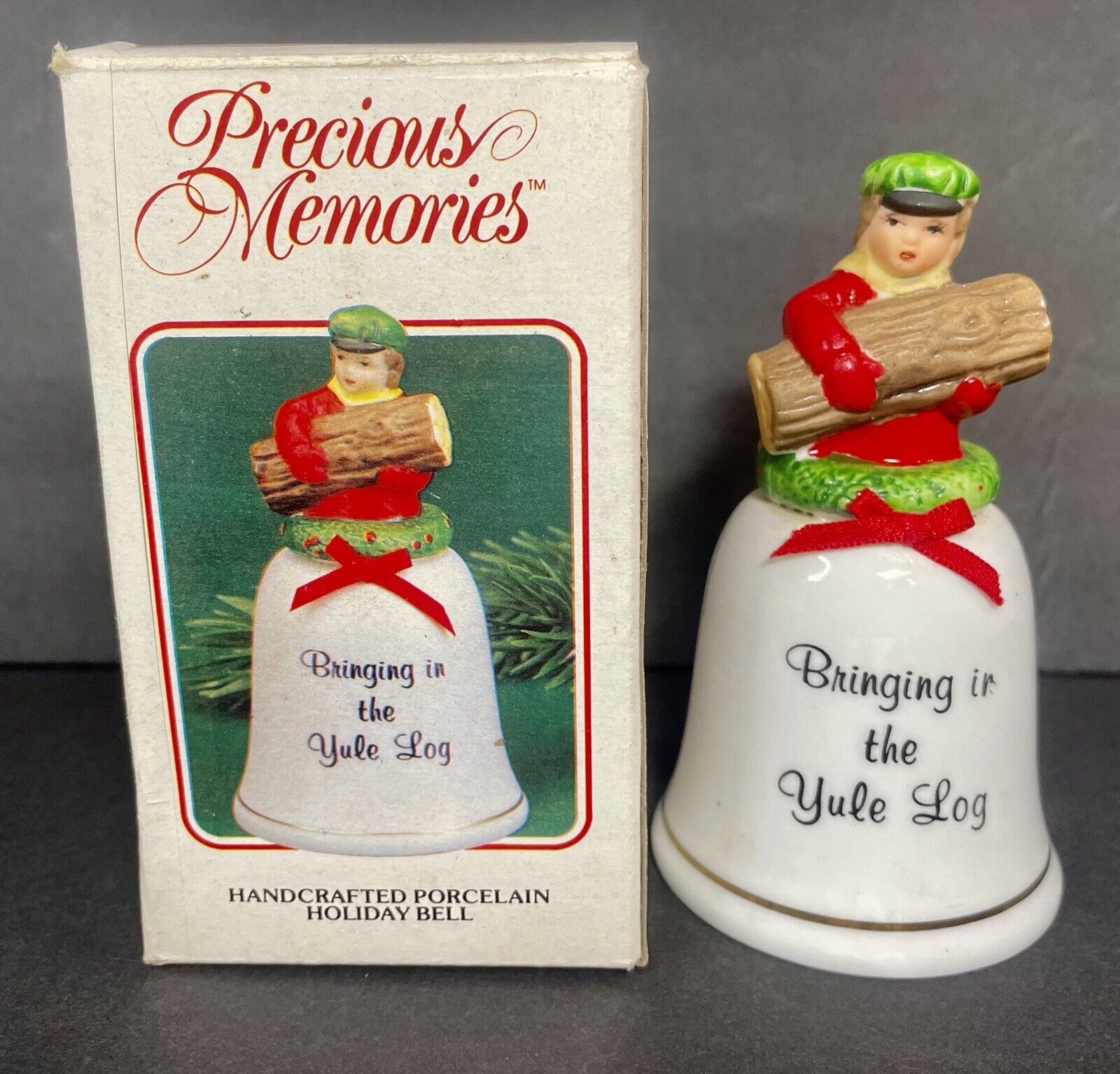 Precious Memories Handcrafted Porcelain Holiday Bell Bringing in the Yule Log