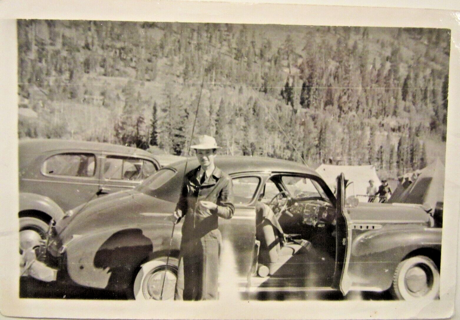 1941 BUICK SPECIAL COUPE & fisherman @ campground, b&w photo, 4 1/2\