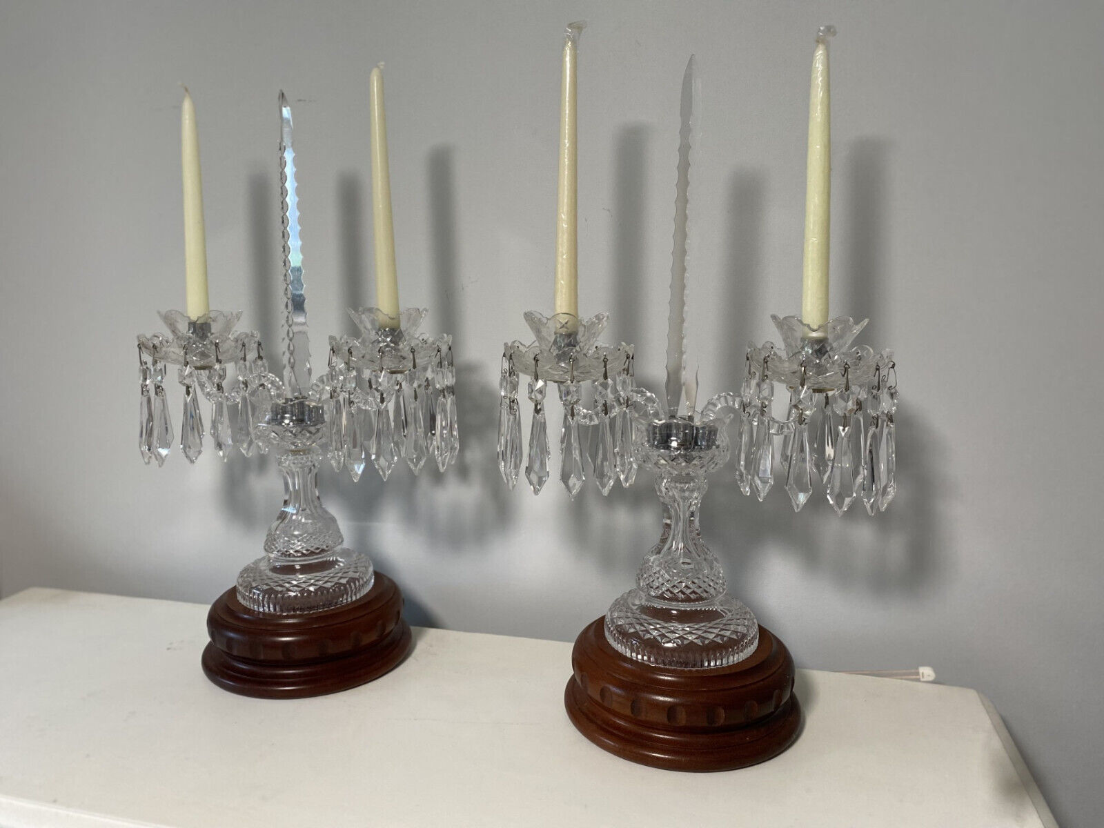 pair of cut leaded glass candleholders  23\