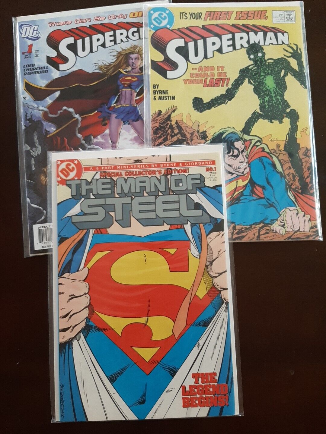 superman lot (3) #1\'s superman 1986 and \'87 byrne art,supergirl\'05 churchill  NM