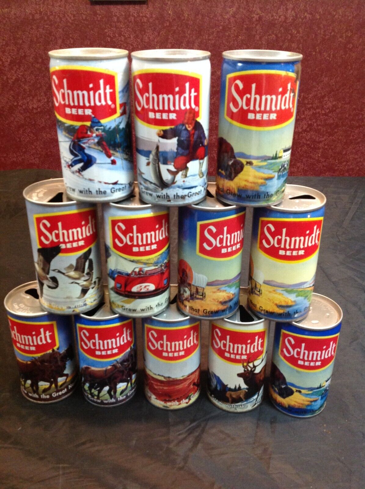 Lot of 12 vintage steel Schmidt wildlife pull tab empty beer can collection