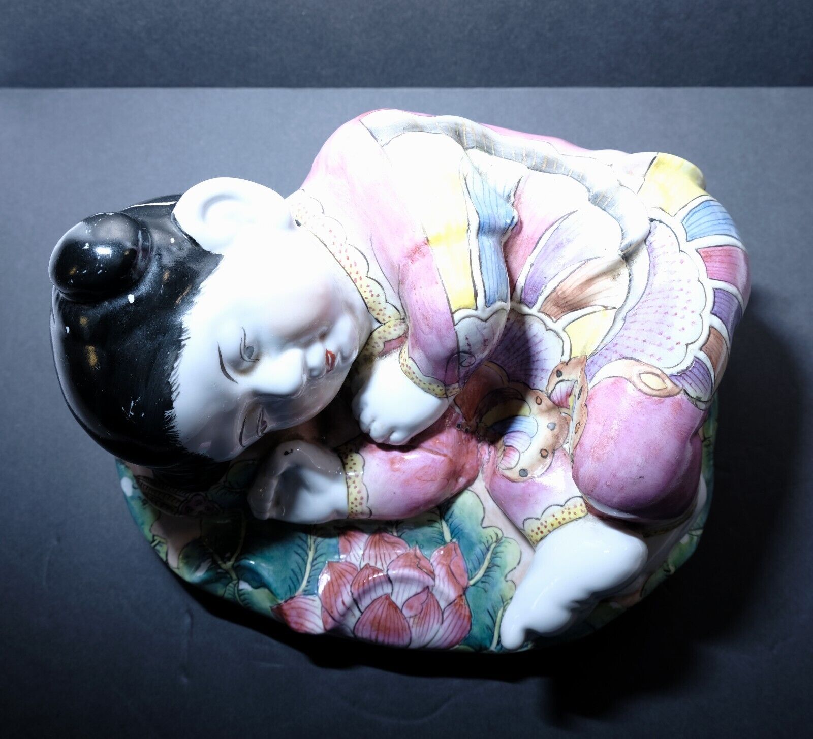 Vintage reclining chubby baby on lotus flower Chinese porcelain intricate design