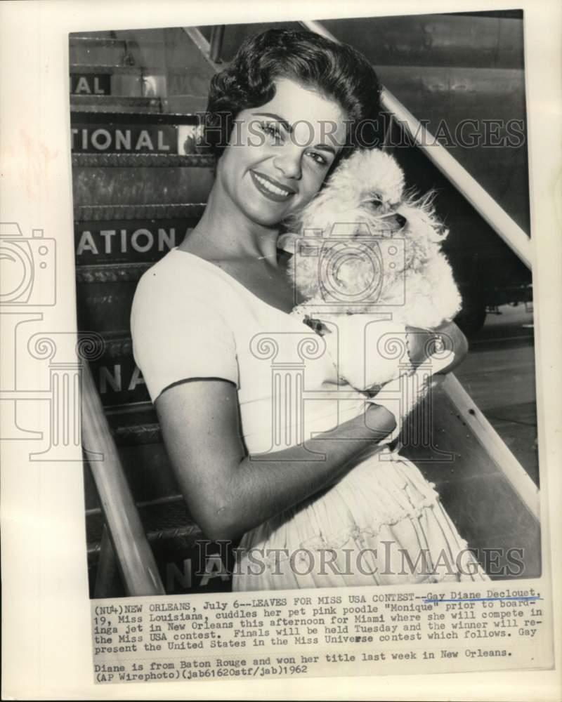 1962 Press Photo Miss Louisiana Gay Declouet holds poodle - New Orleans airport