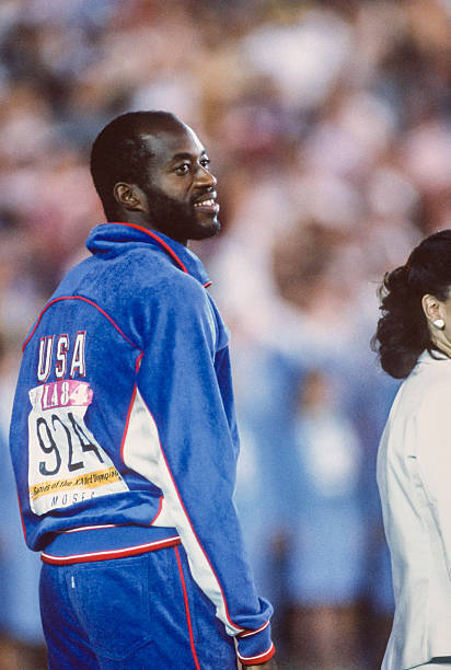 Edwin Moses looks crowd prior to awards ceremony for Mens 400m- 1984 Old Photo