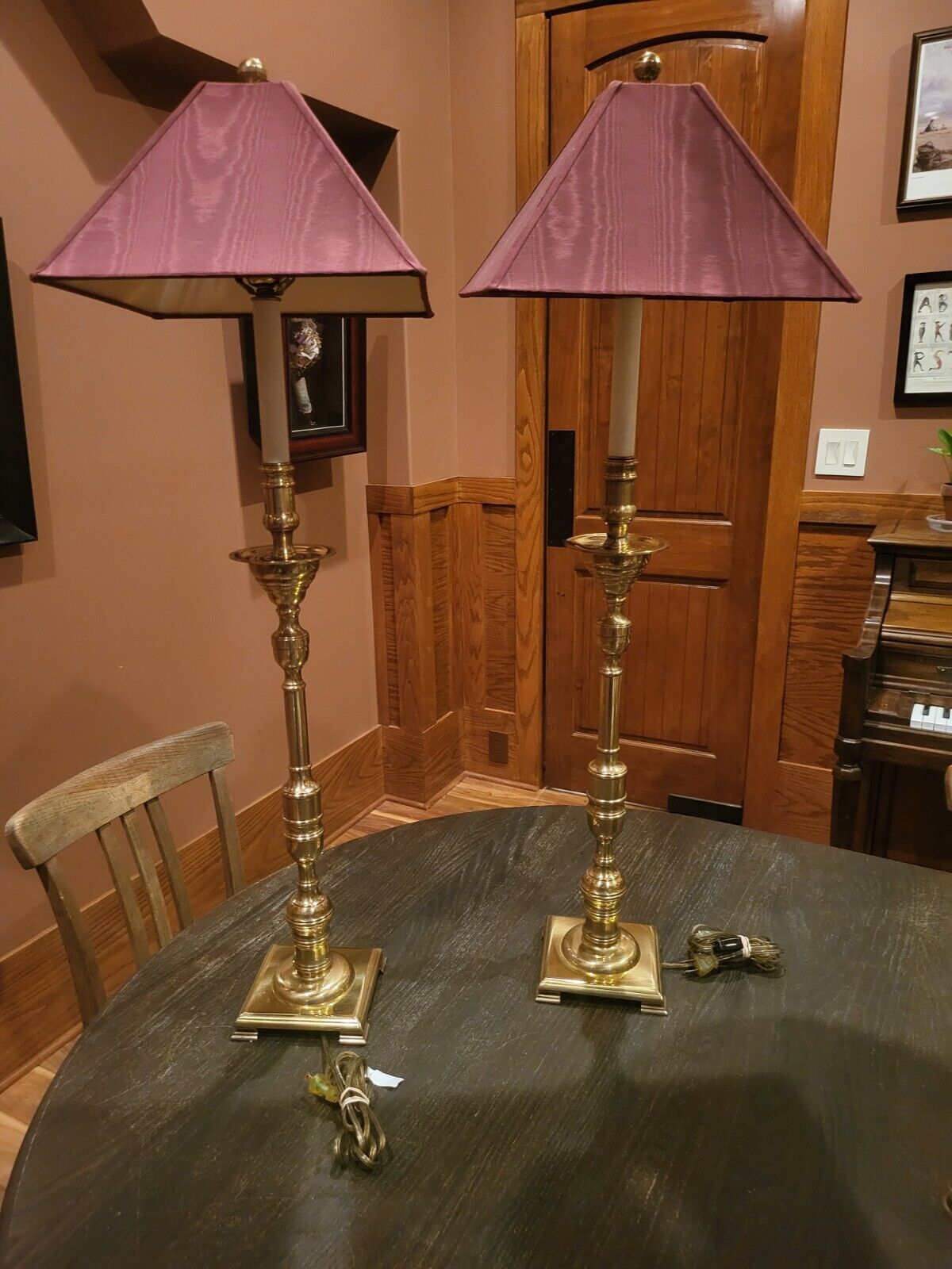 Pair of Tall Frederick Cooper Solid Bass Candlestick Lamps With Original Shades.