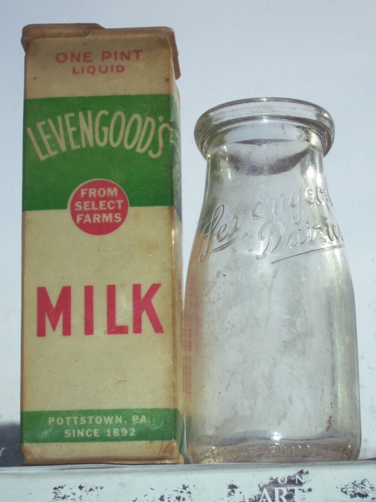 Vintage Levengoods Dairies milk bottle & plastic milk carton Pottstown, Pa,