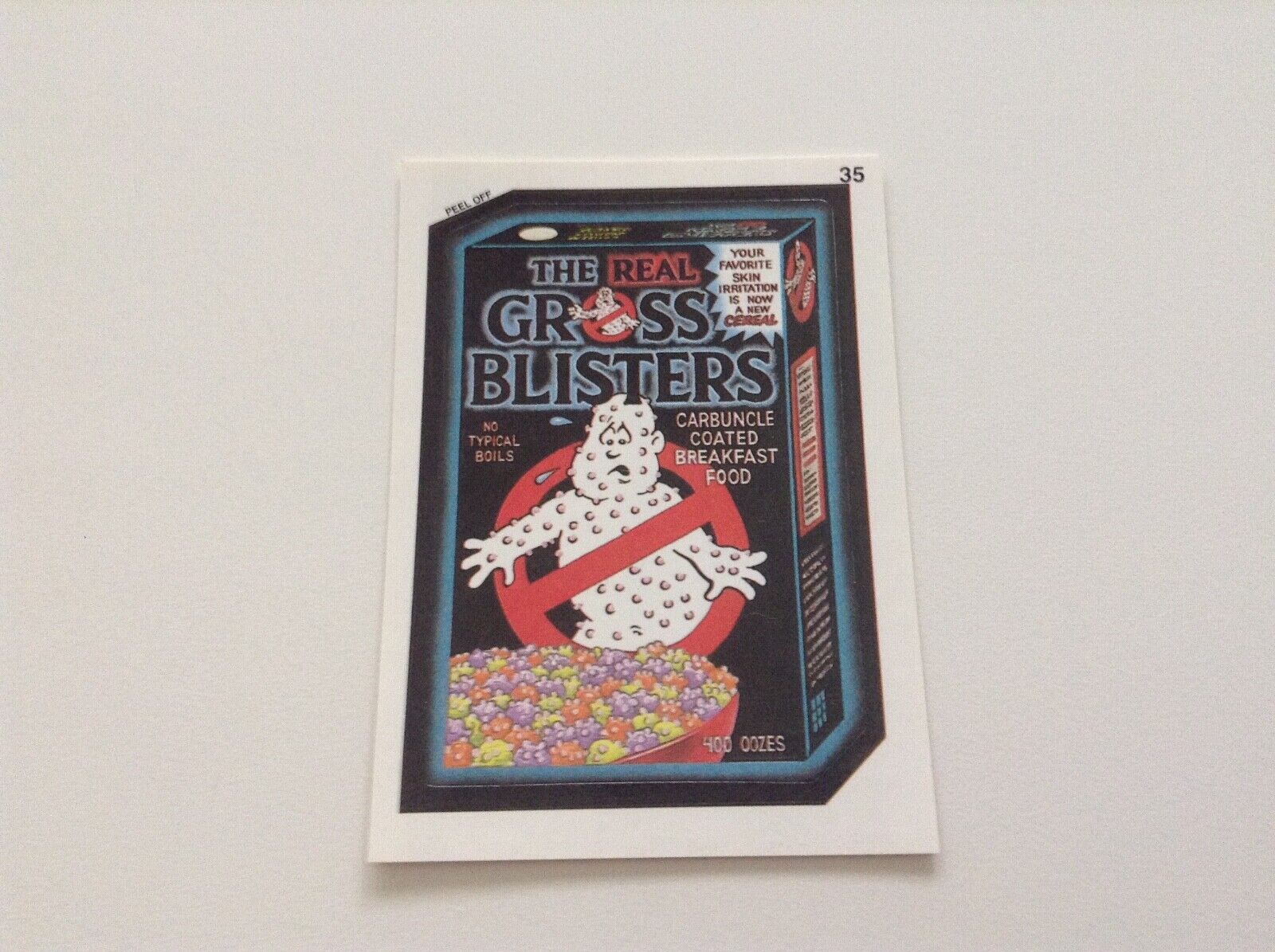 GHOSTBUSTERS CEREAL 1991 TOPPS WACKY PACKAGES PARODY CARD #35, GROSS BLISTERS NM