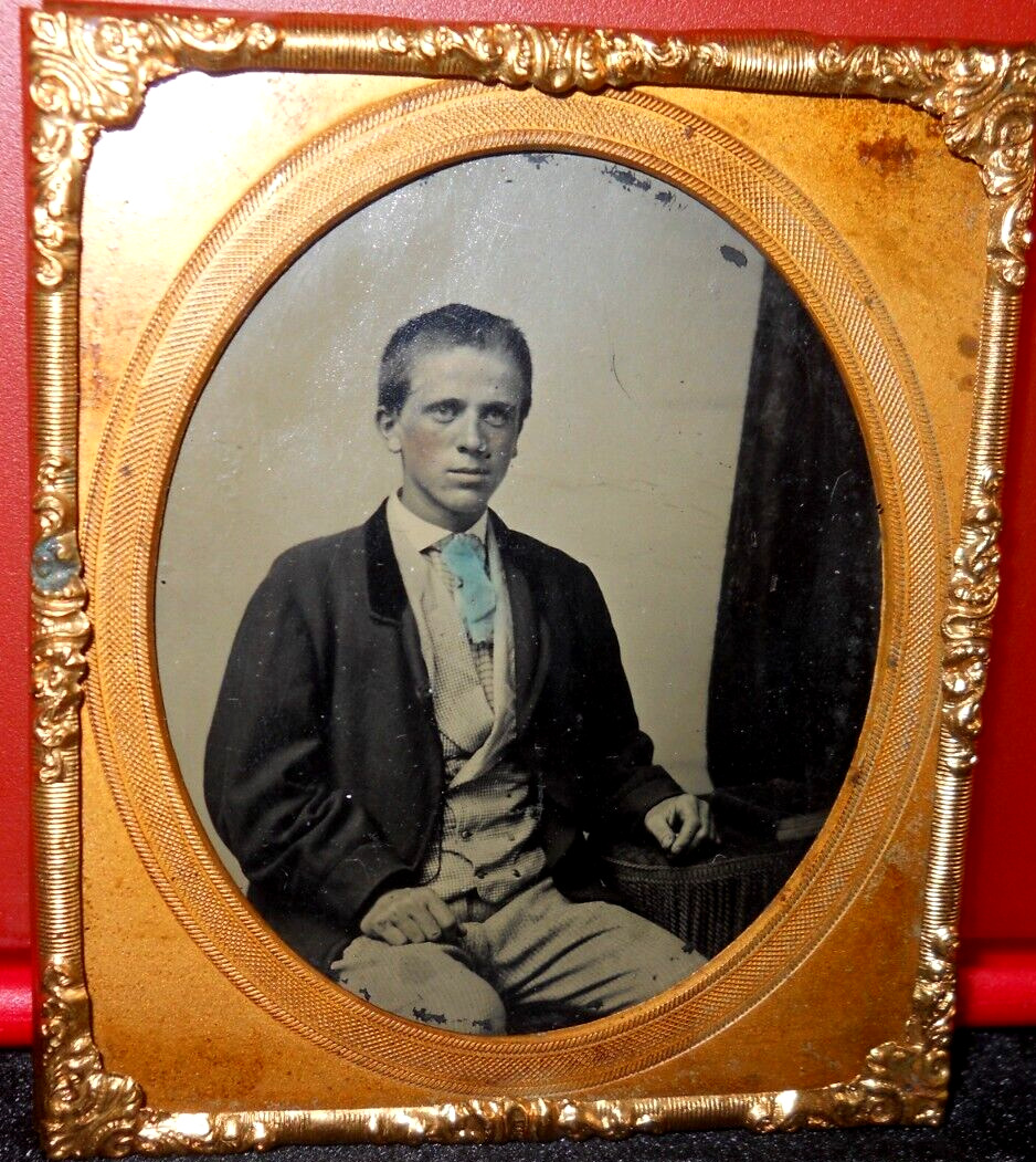1/6th Size tinted Tintype of young man in brass mat/frame