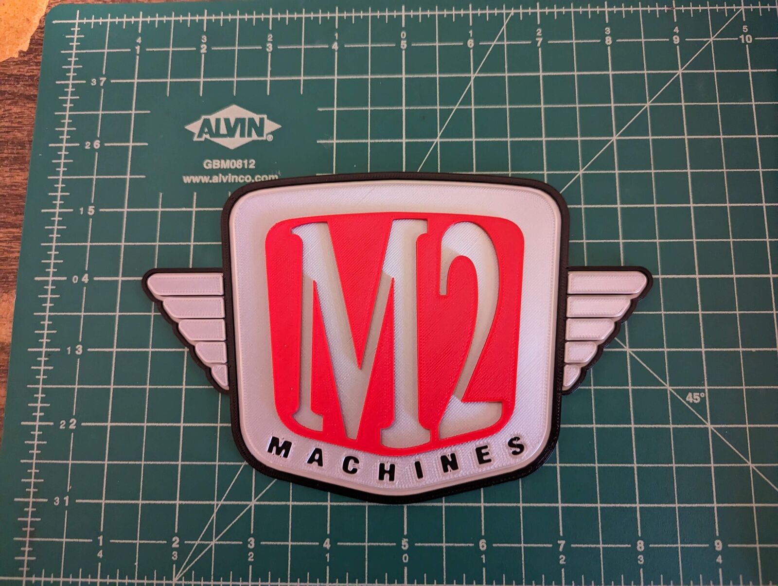 M2 Machines 3D printed logo wall display sign