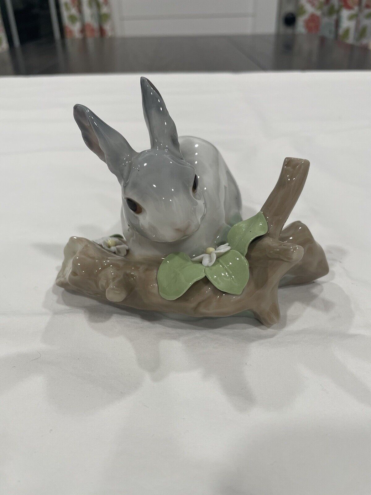 Lladro #4773 Bunny Rabbit On A Log With Flowers