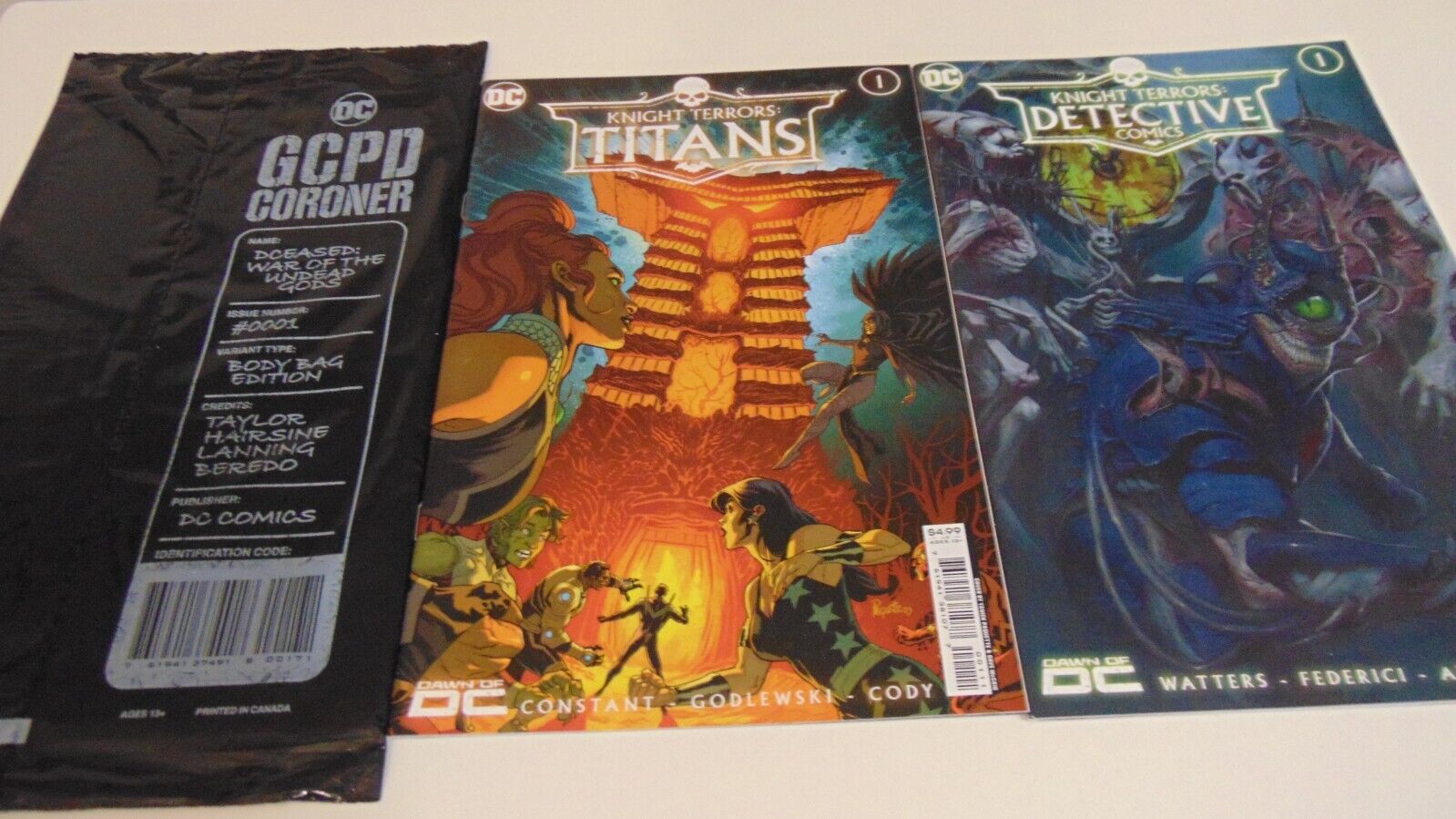 Knight Terrors Detective Comic #1 & TITIANS #1 + GCPD BODYBAG -SEALED LOT OF 3