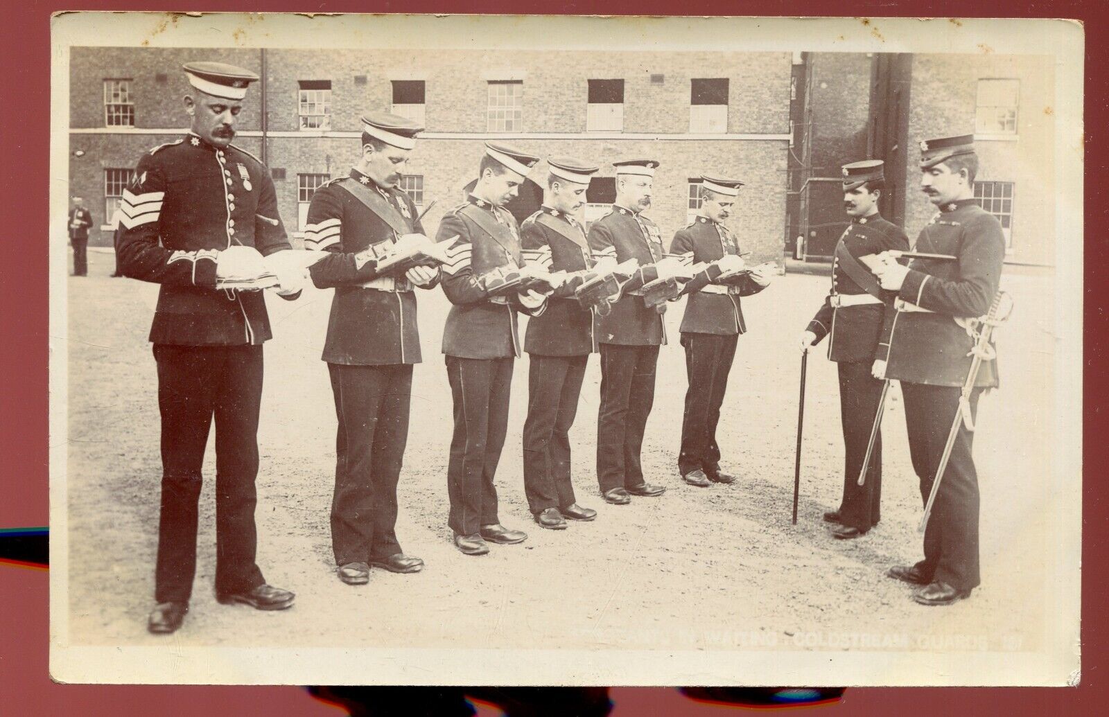 cpa Post Card United Kingdom. Lessons in Waiting Coldstream Guards