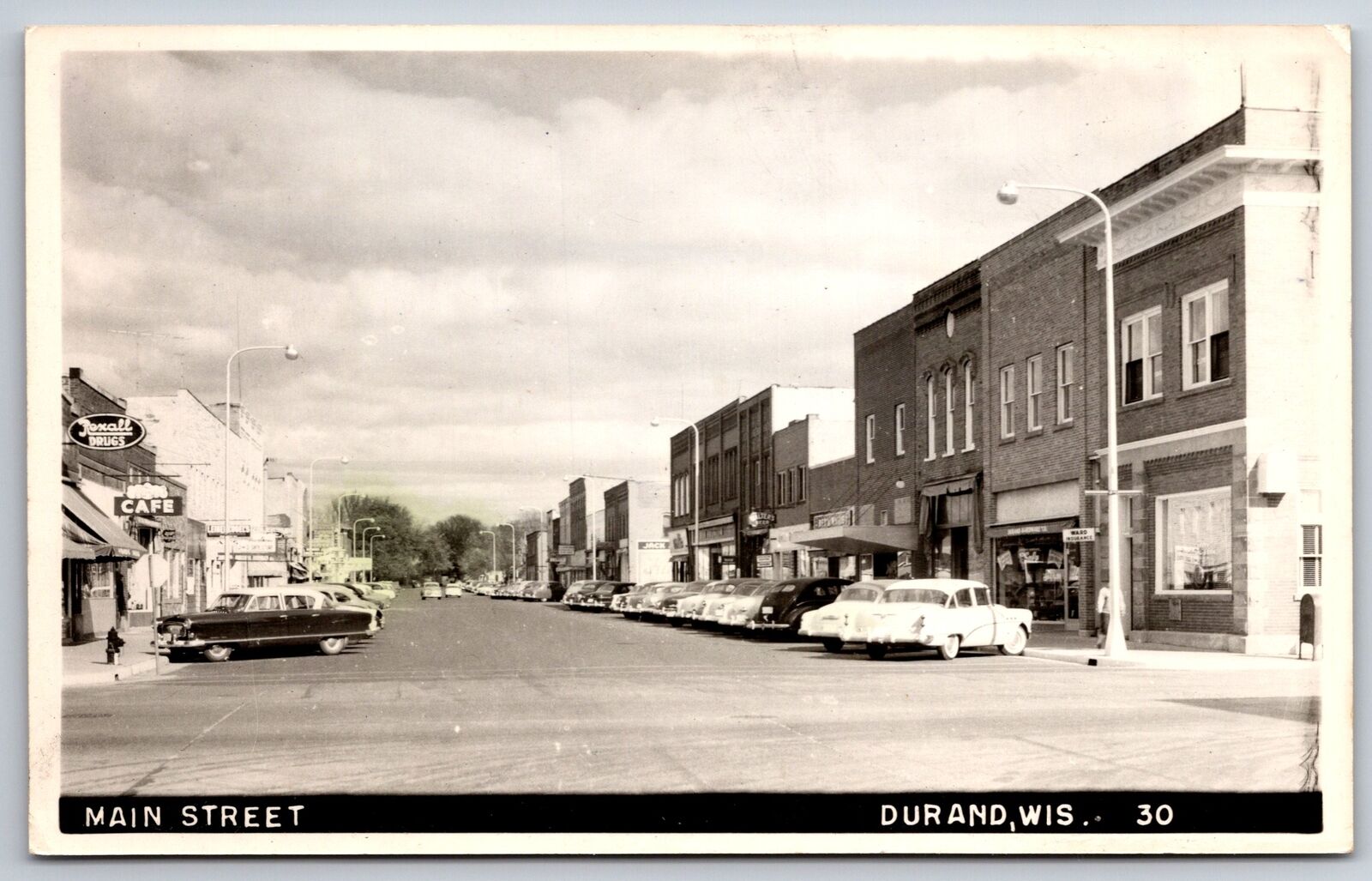 Durand Wisconsin~Main Street Cafe~Rexall Drugstore~1950s Cars RPPC