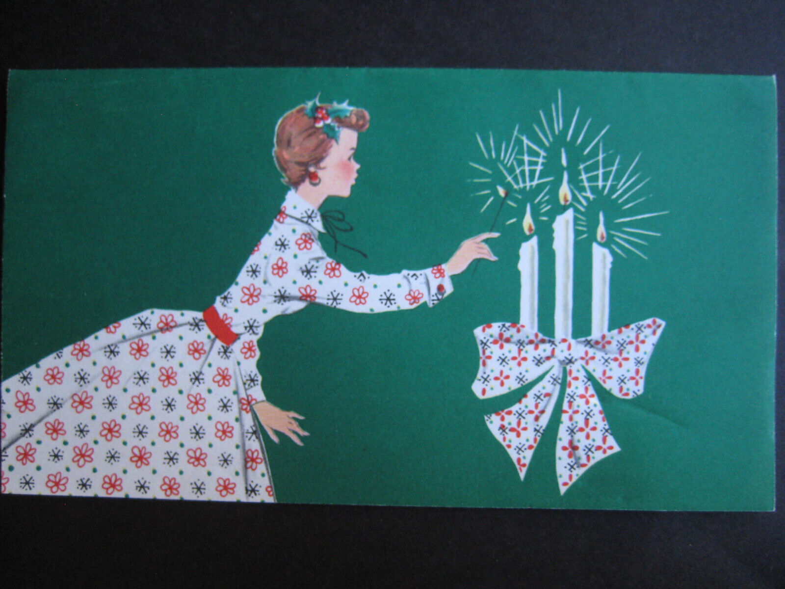 1950s vintage greeting card Norcross CHRISTMAS Woman Lighting Candles