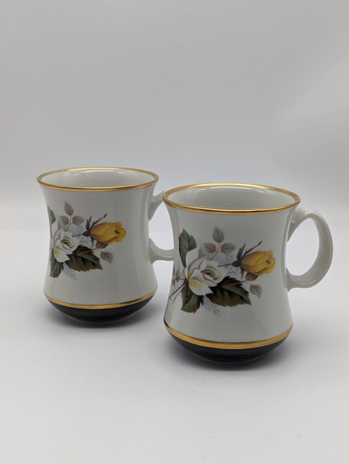 Pair Of Ceramic Mugs Rose Floral Gilded Black Bottoms PB Nickels Ceramics