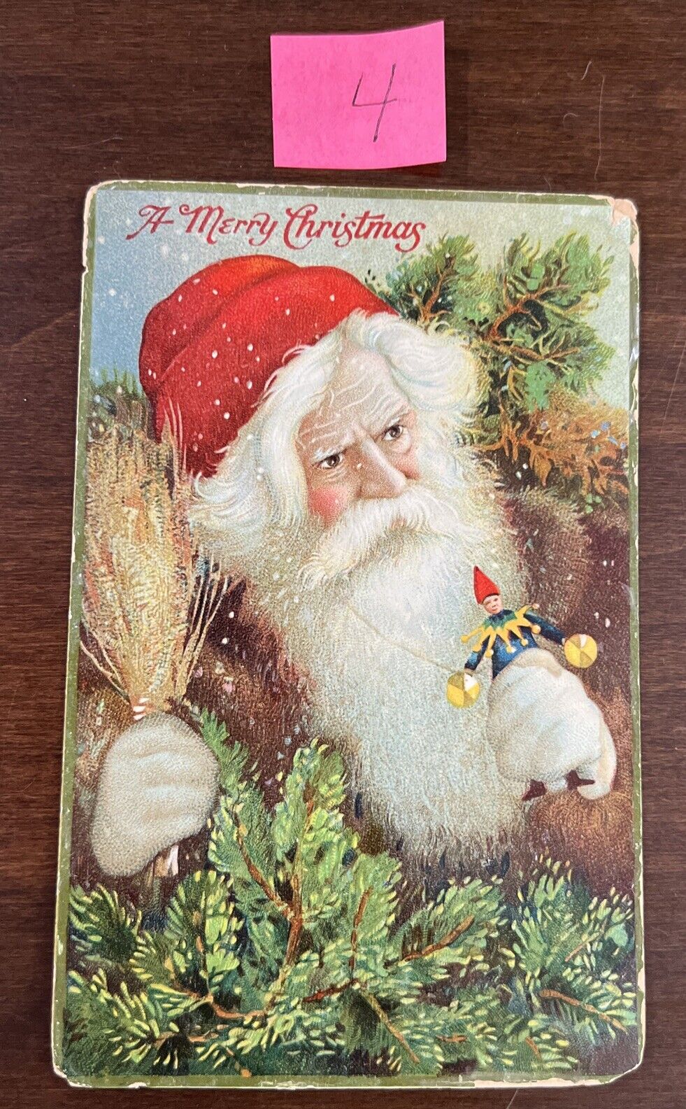 A  RARE CHRISTMAS SANTA Embossed  Postcard  CIRCA 1909