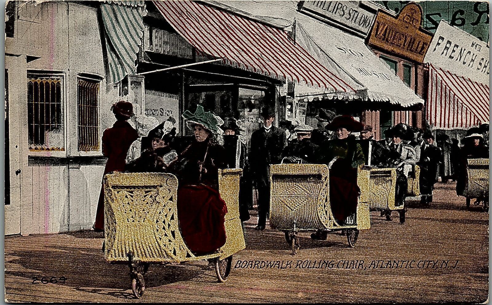 1916 ATLANTIC CITY N.J. BOARDWALK ROLLING CHAIR SHOPPING LADIES POSTCARD 14-109