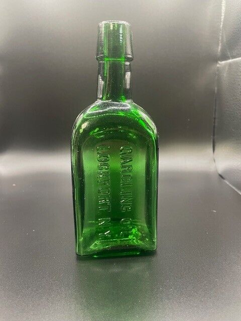 Antique  Gargling Oil Lockport N.Y. Green Bottle - 6 in. high
