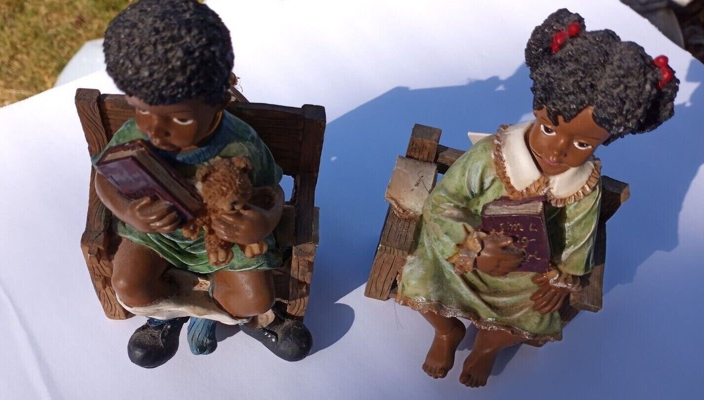 VINTAGE YOUNGS BLACK BOY AND GIRL SITTING ON BENCH READING BOOK FIGURINES