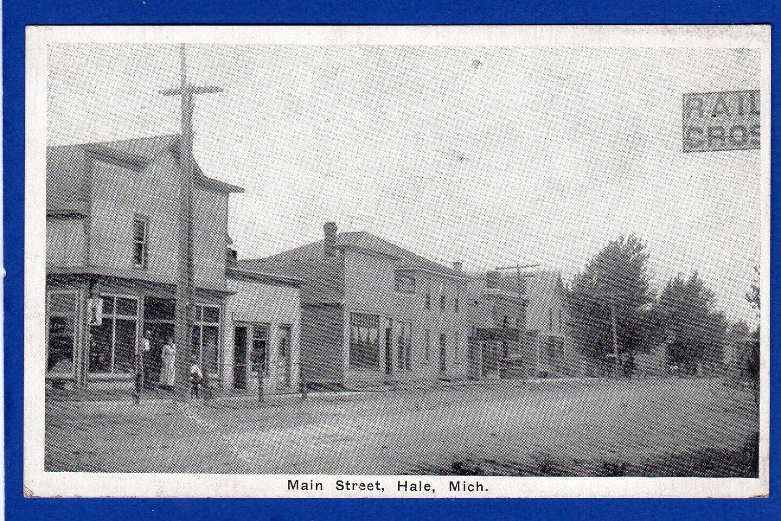 Hale Michigan Main Street. Stores, Town Scene MI Postcard 1924