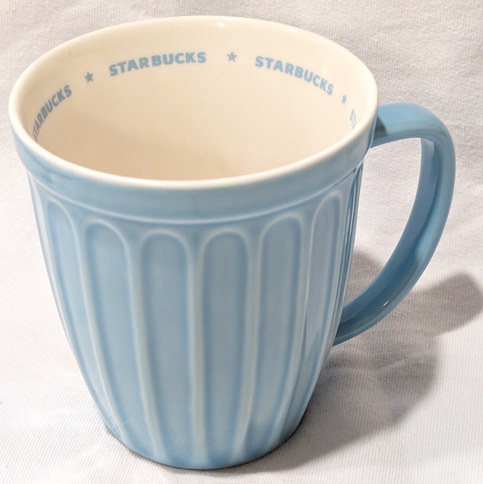 2006 Starbucks Aqua Baby Blue Ribbed Circular Spellout Fluted Coffee Mug Cup EUC