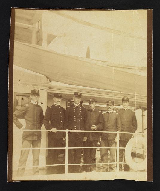 Photo:[Major General Henry Ware Lawton and staff standing on ship]