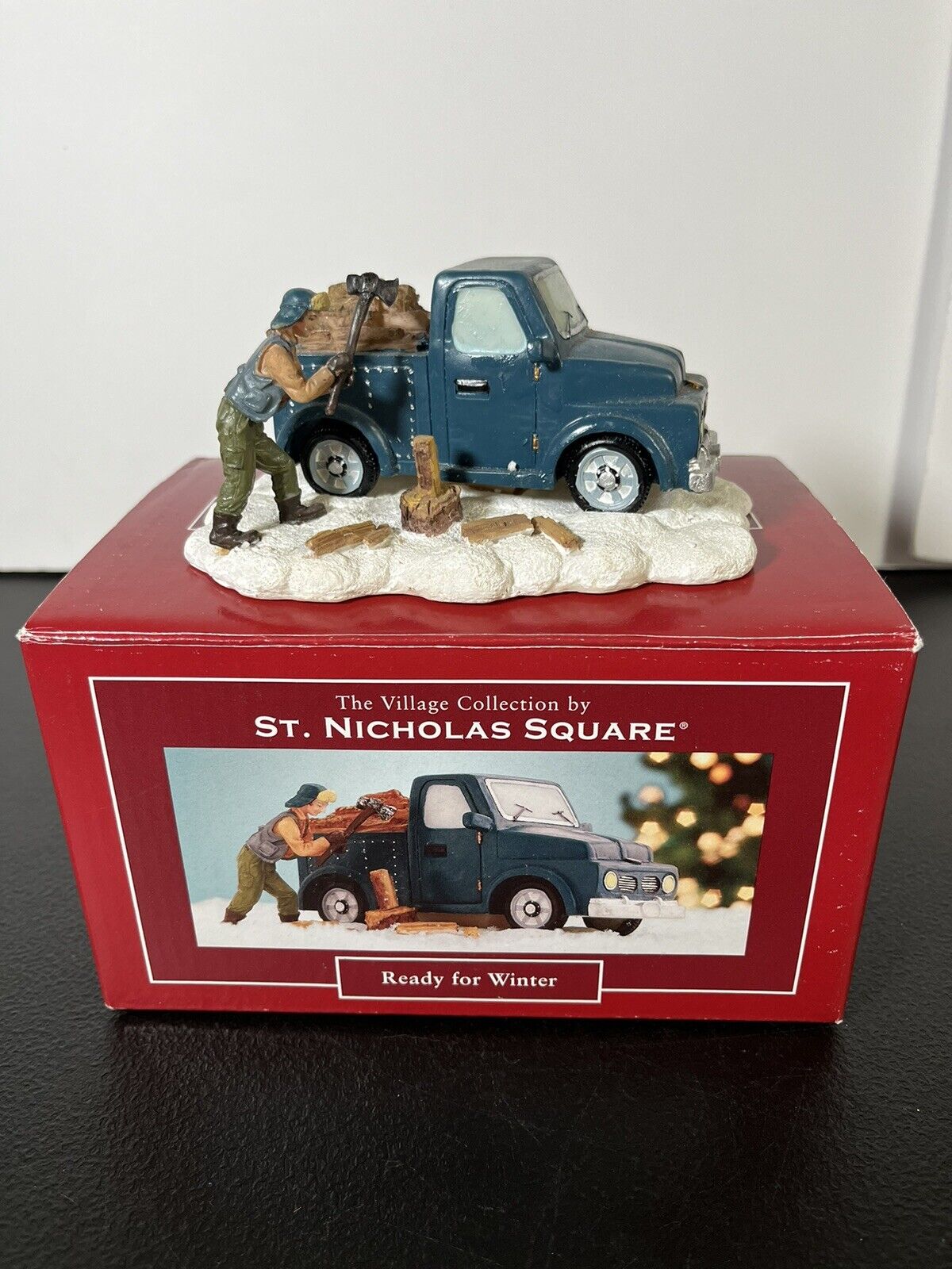 St. Nicholas Square Christmas Village Figure Ready for Winter Blue Truck
