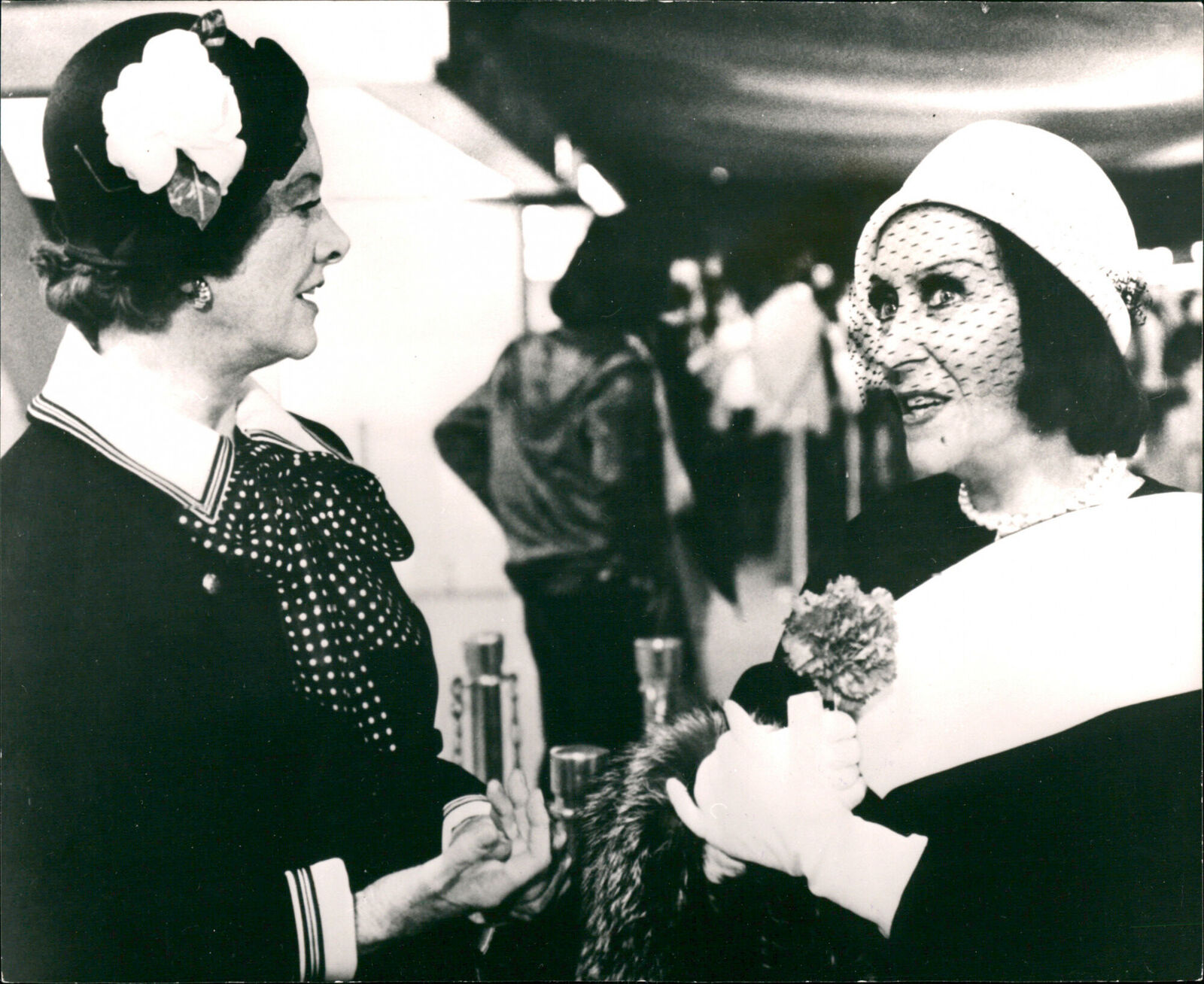 Myrna Loy and Gloria Swanson in conversation be... - Vintage Photograph 2529977