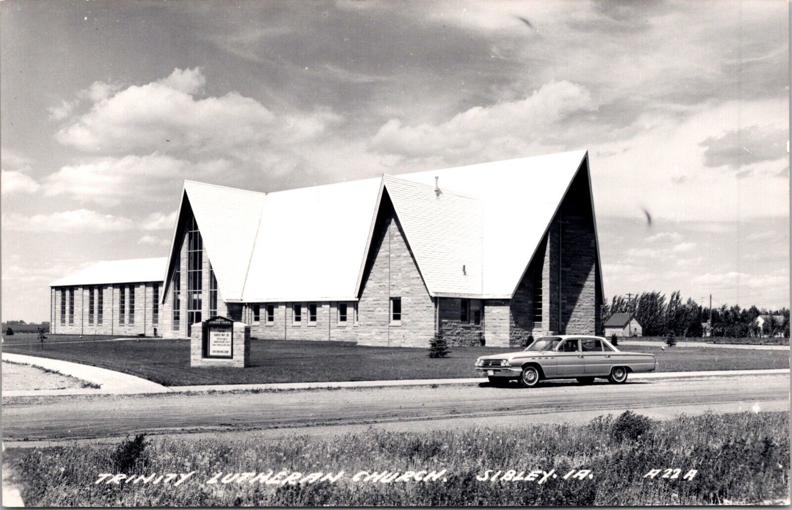 Real Photo Postcard Trinity Lutheran Church in Sibley, Iowa