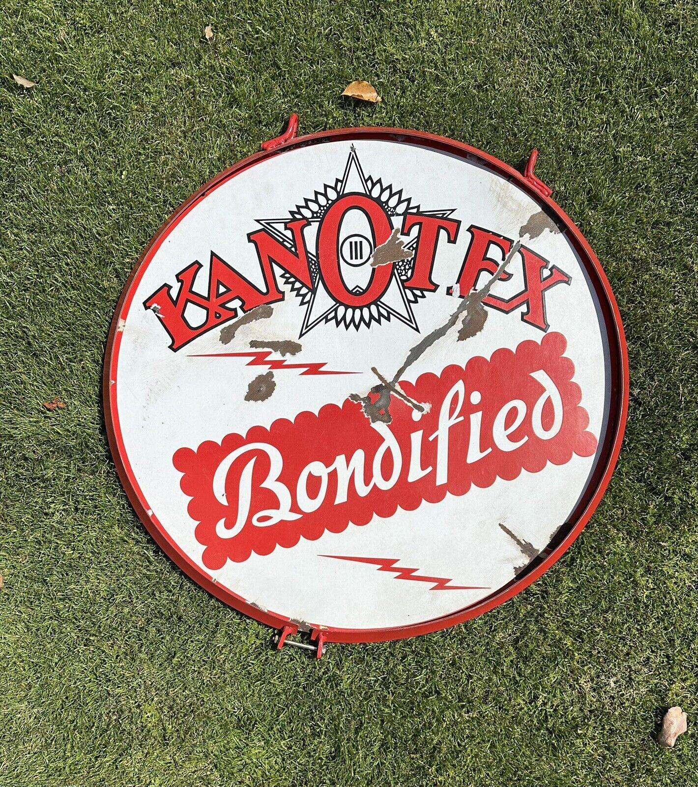 Vintage Original Kan O Tex Bondified Double Sided Porcelain Sign In A Ring.