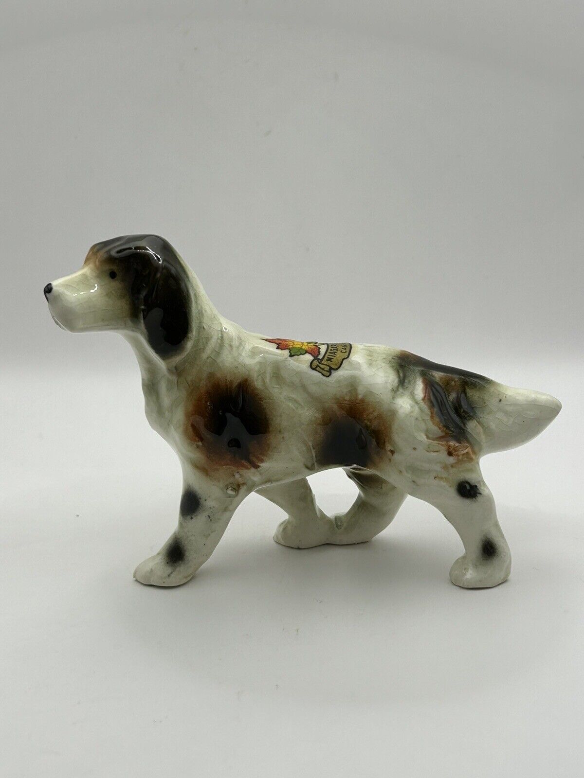 Spaniel Dog Figurine Souvenir Of Niagara Falls 3.25”Hx4.5”Lx1”W Unbranded
