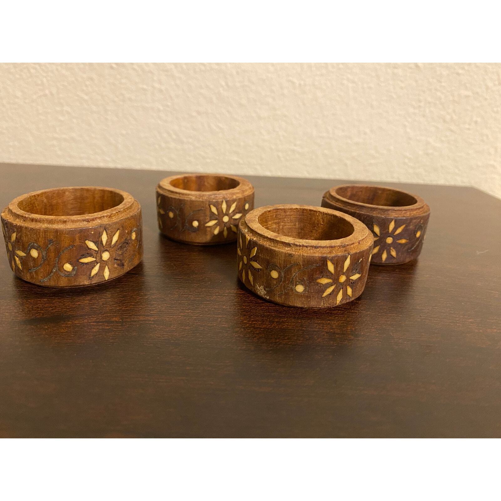 Set of 4 Vintage wooden carved napkin rings with inlay