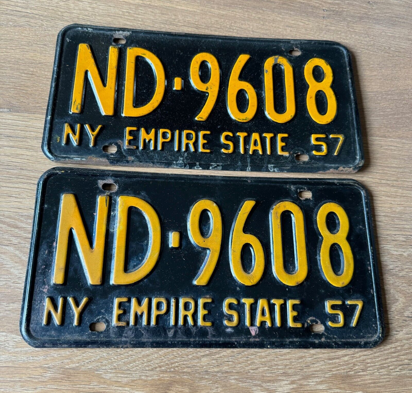 TWO VINTAGE 1957 NEW YORK STATE LICENSE PLATES BOTH WITH THE SAME NUMBER ND-9608