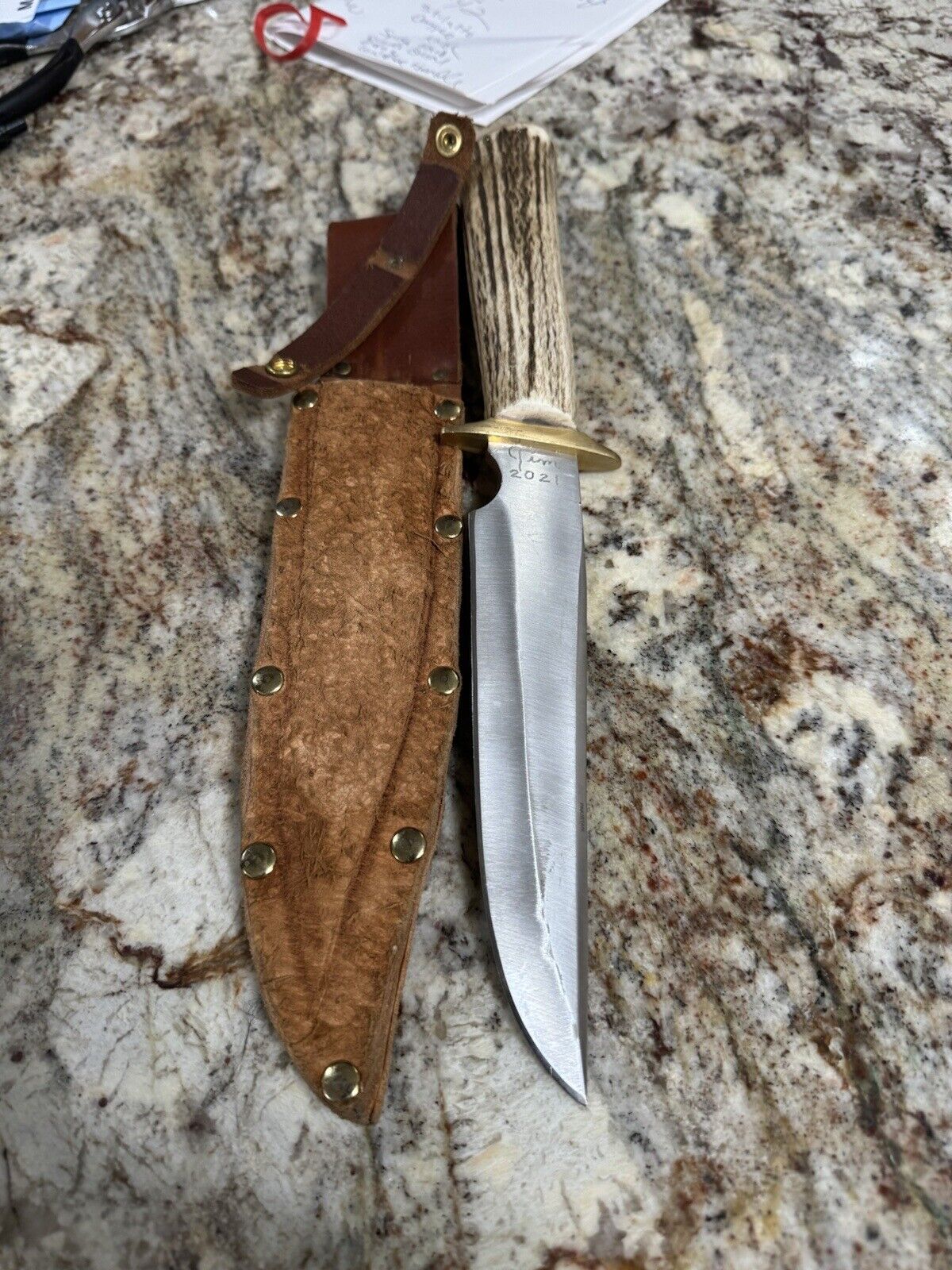 a large handmade stainless steel /bone handle fixed hunting knife