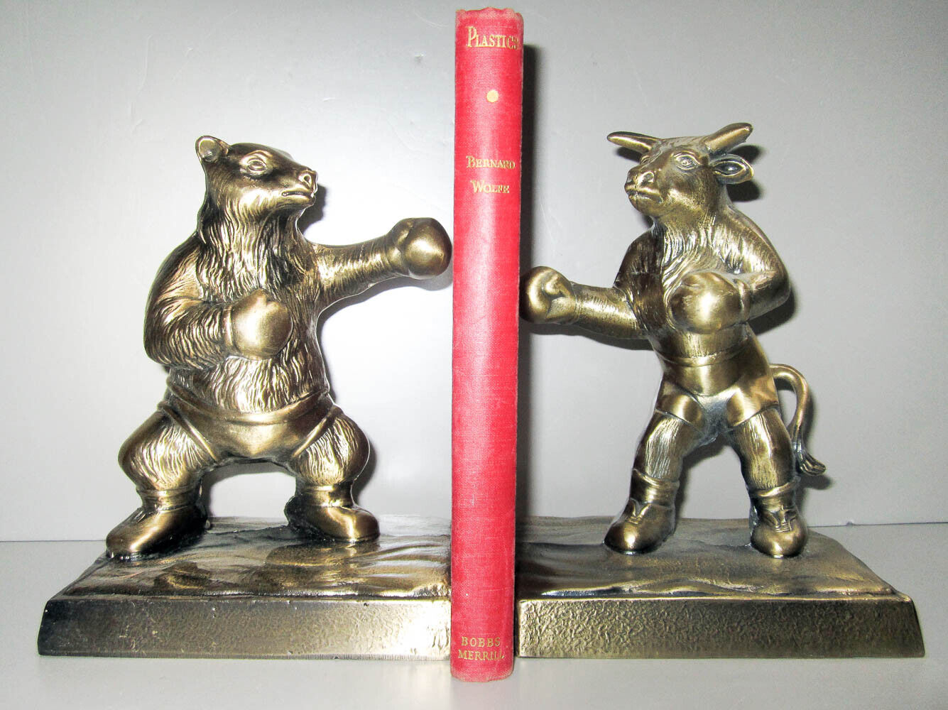 Vintage Bull & Bear stock broker investor brass bookends, a pair, all metal USA