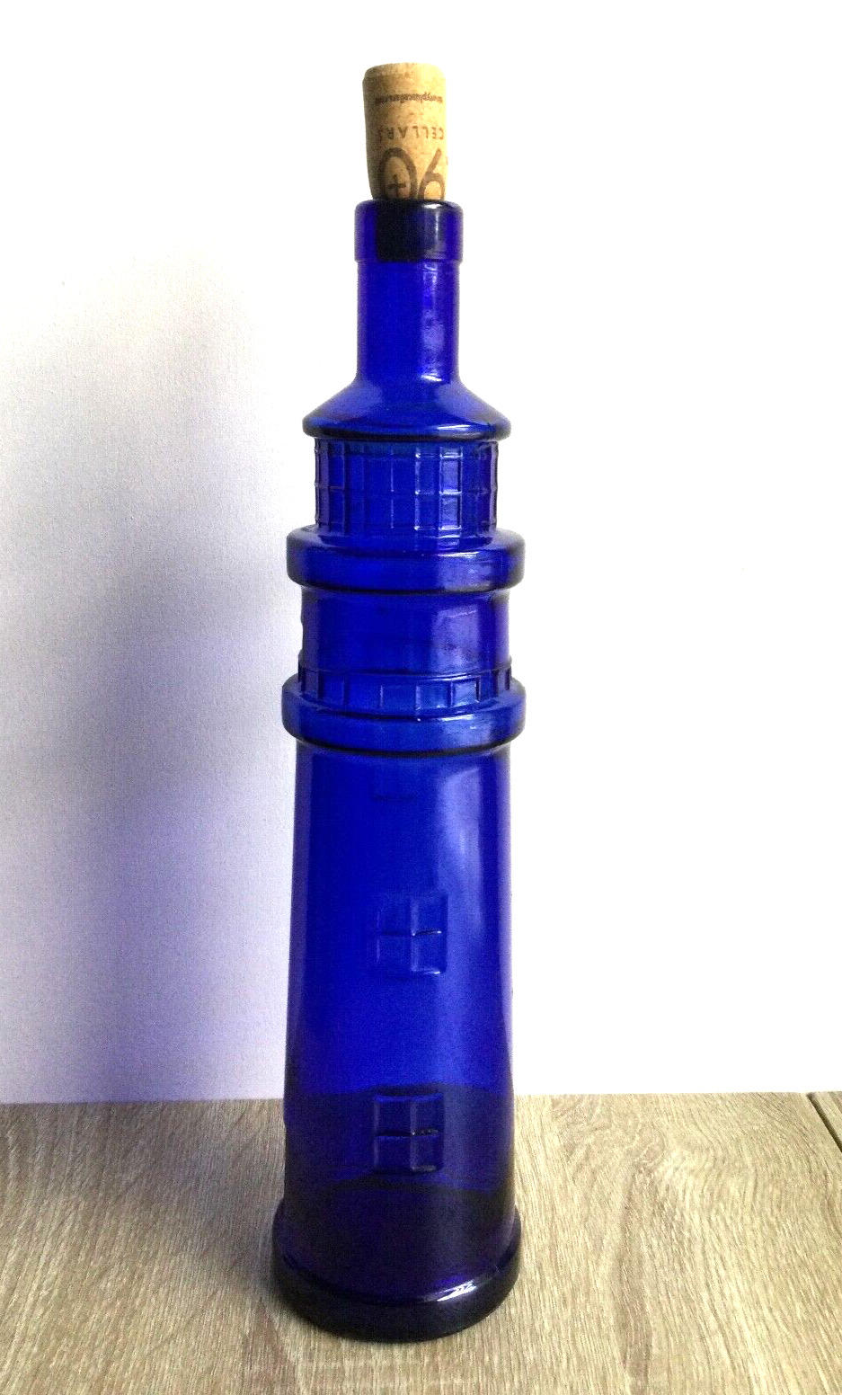 90 + Cellars Cobalt Blue Glass Lighthouse Shaped Empty Nautical Wine Bottle