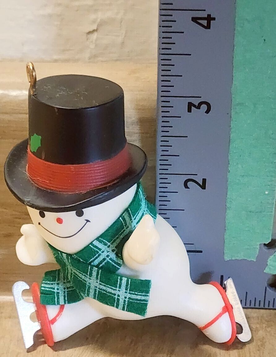 Vintage Hallmark Christmas Ornament Snowman in Mistletoe Top Hat With Red Skates
