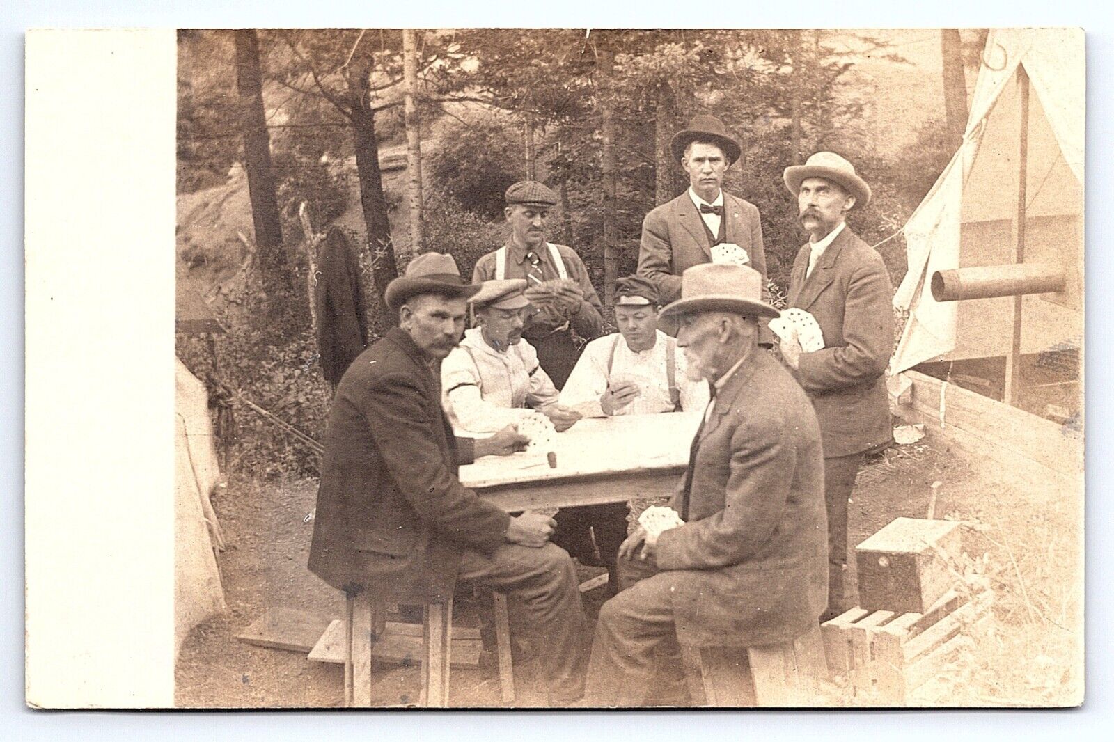Postcard RPPC Group of Men at Camp Playing a Card Game Poker, etc...