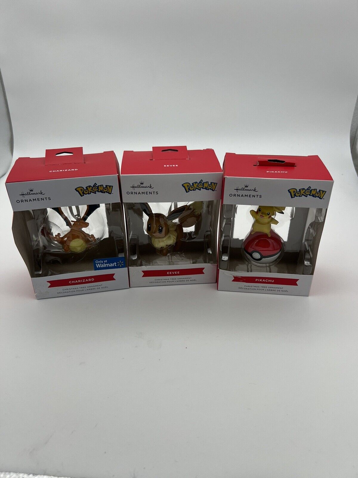 Lot of 3 NEW Hallmark Pokemon Christmas Ornaments PIKACHU EEVEE CARIZARD